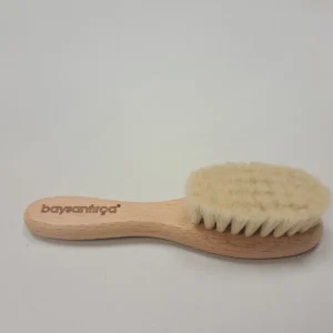 Keçi kılı bebek saç fırçasının ahşap sapı ve oval kıl başlığı